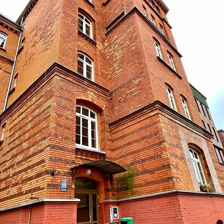Ceglany Apartman *